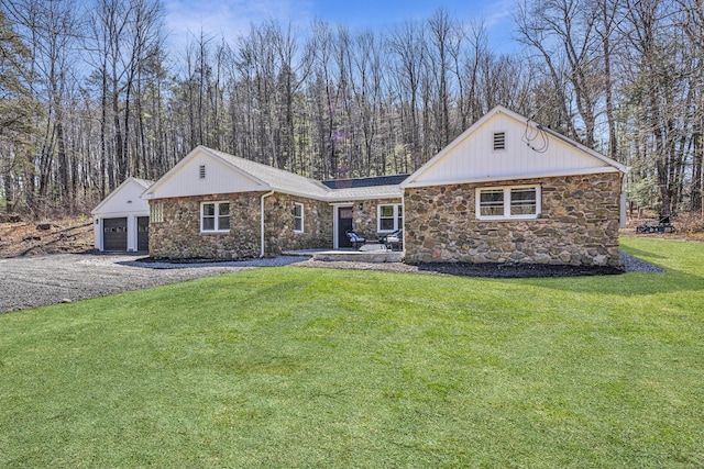 45 Westledge Rd, Simsbury, CT 06092 - ranch-style home featuring stone siding, a front yard, a garage, and driveway