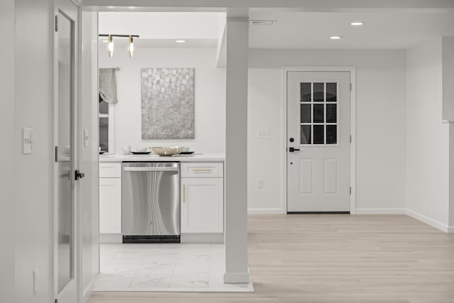 45 Westledge Rd, Simsbury, CT 06092 - kitchen featuring stainless steel dishwasher, white cabinets, recessed lighting, light countertops, and light wood-type flooring