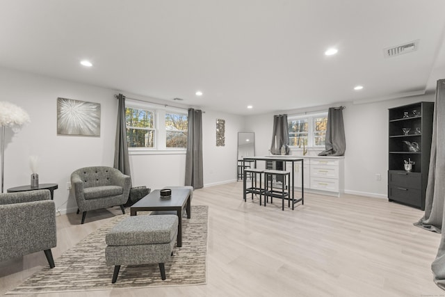 45 Westledge Rd, Simsbury, CT 06092 - living room with recessed lighting, light wood-style flooring, and healthy amount of natural light