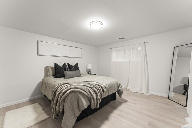 45 Westledge Rd, Simsbury, CT 06092 - bedroom featuring light wood-style floors and baseboards