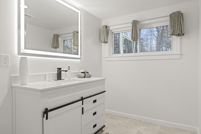 45 Westledge Rd, Simsbury, CT 06092 - bathroom with vanity and marble look tiles