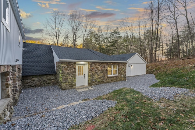 45 Westledge Rd, Simsbury, CT 06092 - view of garage at dusk