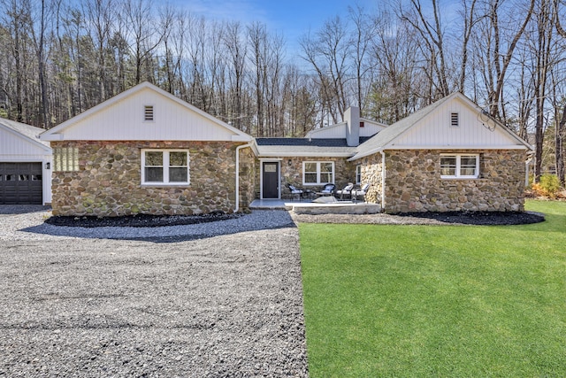 45 Westledge Rd, Simsbury, CT 06092 - view of front of property with stone siding, an outbuilding, a front yard, and a chimney