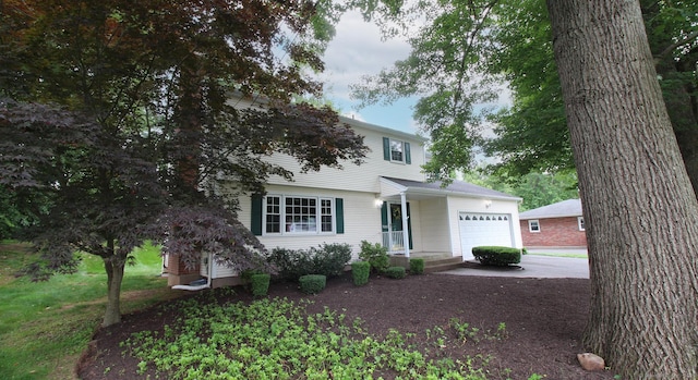 154 Sandy Ln, Meriden, CT 06450 - view of front of property featuring an attached garage and driveway