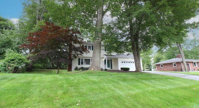 154 Sandy Ln, Meriden, CT 06450 - view of front of property featuring an attached garage, a front lawn, and concrete driveway