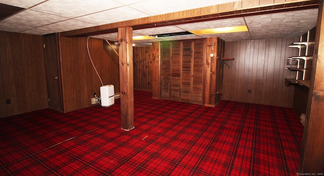 154 Sandy Ln, Meriden, CT 06450 - finished basement featuring carpet floors, wood walls, and a paneled ceiling