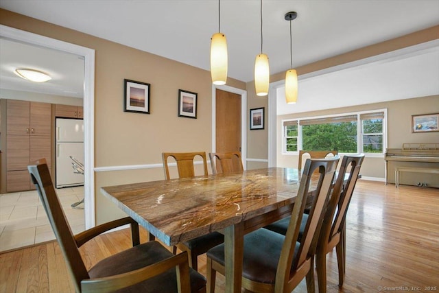 60 Ranch Rd, Milford, CT 06460 - dining space featuring light wood-type flooring and baseboards