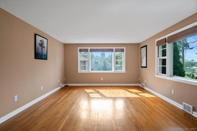 60 Ranch Rd, Milford, CT 06460 - spare room featuring healthy amount of natural light and light wood-type flooring