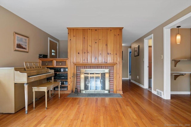 60 Ranch Rd, Milford, CT 06460 - living room featuring a fireplace and wood finished floors