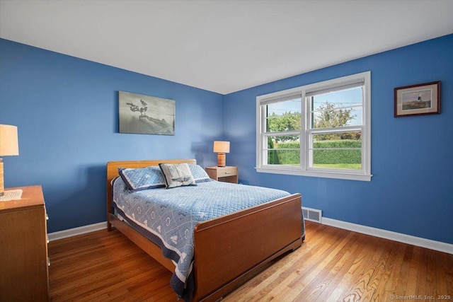 60 Ranch Rd, Milford, CT 06460 - bedroom with baseboards and wood finished floors
