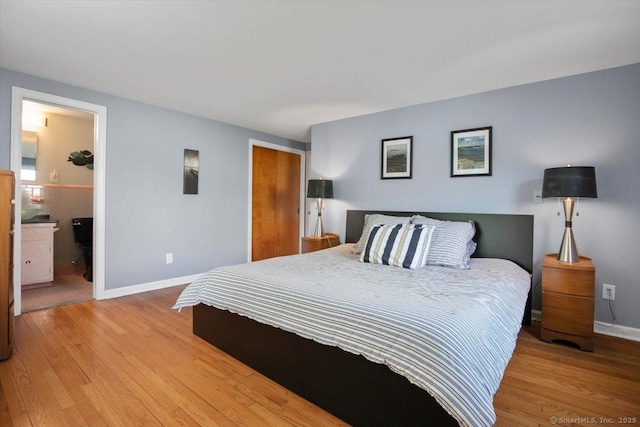 60 Ranch Rd, Milford, CT 06460 - bedroom with light wood-style flooring, a closet, and ensuite bath