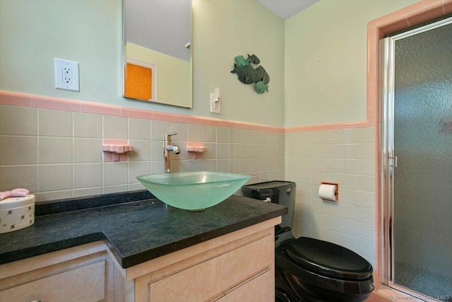 60 Ranch Rd, Milford, CT 06460 - bathroom featuring a shower stall, tile walls, vanity, and a wainscoted wall