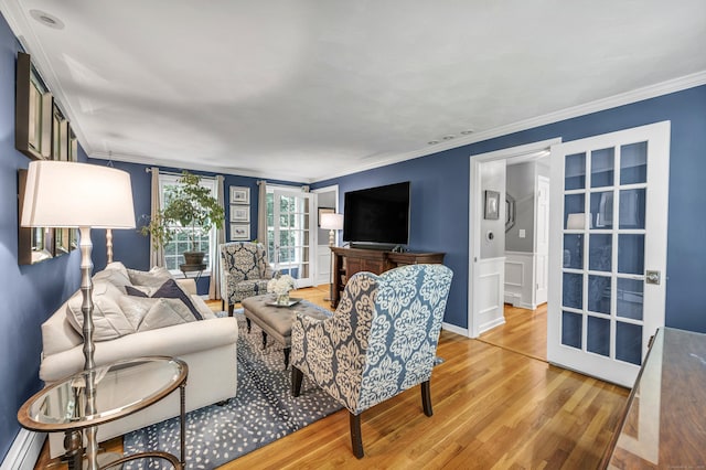 31 Country Way, Madison, CT 06443 - living room featuring light wood finished floors, crown molding, and wainscoting