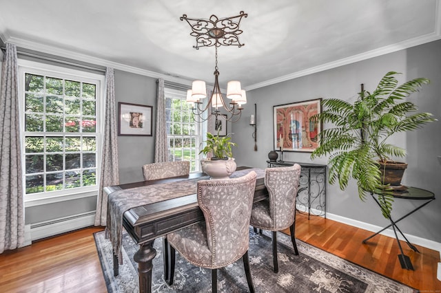 31 Country Way, Madison, CT 06443 - dining area with a chandelier, wood finished floors, crown molding, and a baseboard heating unit