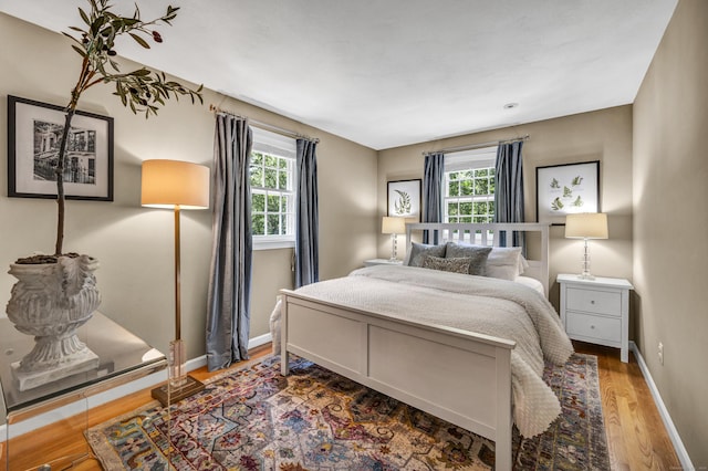 31 Country Way, Madison, CT 06443 - bedroom featuring multiple windows and wood finished floors