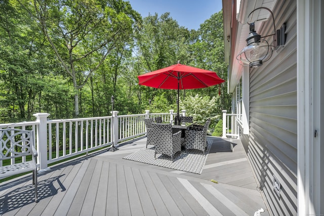 31 Country Way, Madison, CT 06443 - deck featuring outdoor dining space and view of wooded area