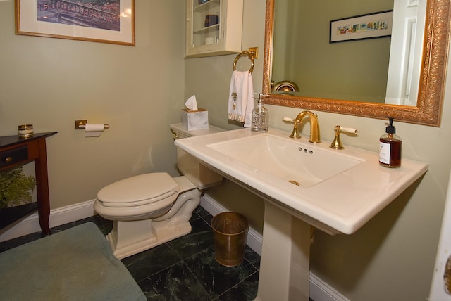 16 Brookfield Dr, Ellington, CT 06029 - half bathroom featuring baseboards and marble finish flooring