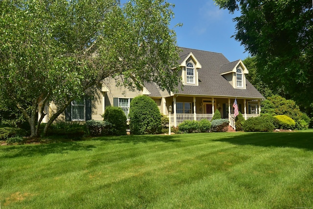 16 Brookfield Dr, Ellington, CT 06029 - cape cod house with a porch, a front yard, and a shingled roof