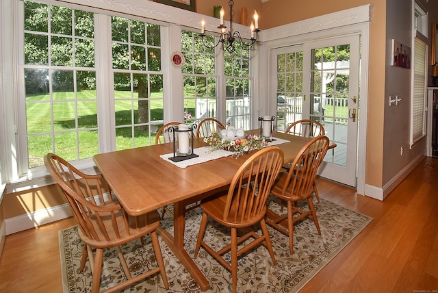 16 Brookfield Dr, Ellington, CT 06029 - dining room with a chandelier and light wood-style flooring