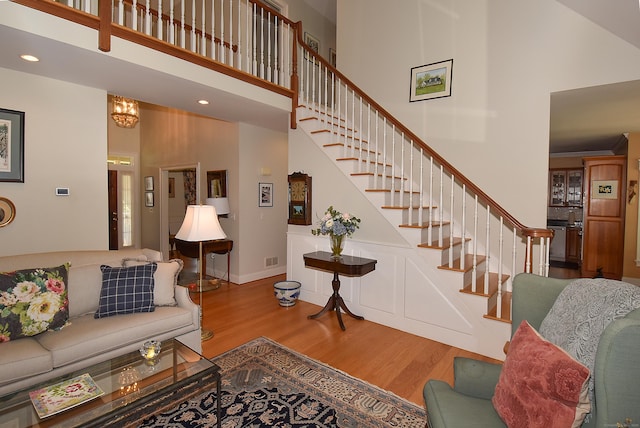 16 Brookfield Dr, Ellington, CT 06029 - living room with a high ceiling, wood finished floors, stairway, and recessed lighting