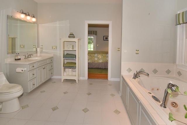 16 Brookfield Dr, Ellington, CT 06029 - ensuite bathroom featuring a tub with jets, vanity, and tile patterned floors