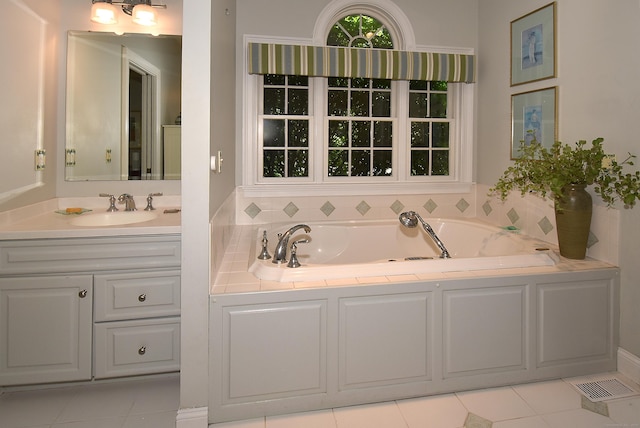 16 Brookfield Dr, Ellington, CT 06029 - bathroom with vanity, a bath, and tile patterned flooring