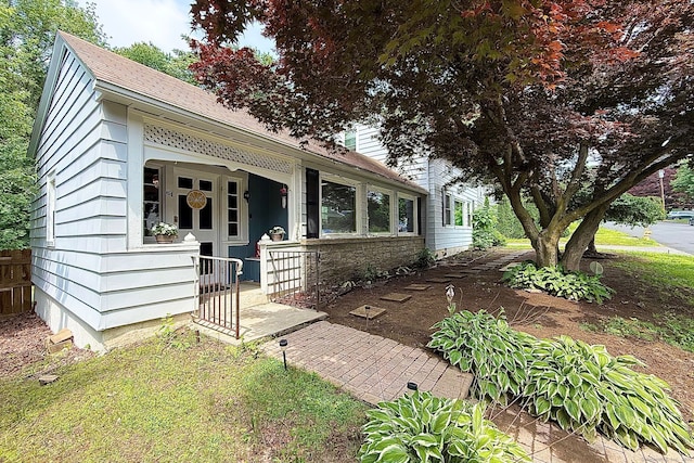 64 Mohawk Ave, Derby, CT 06418 - view of front of home with a porch and a shingled roof