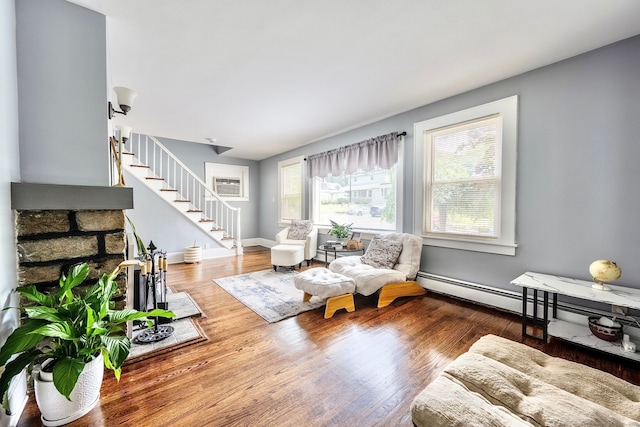 64 Mohawk Ave, Derby, CT 06418 - living area featuring plenty of natural light, stairs, and wood finished floors