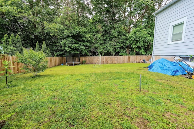 64 Mohawk Ave, Derby, CT 06418 - fenced backyard featuring a trampoline