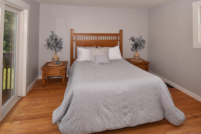 20 Battle St, Somers, CT 06071 - bedroom with light wood-type flooring and access to exterior