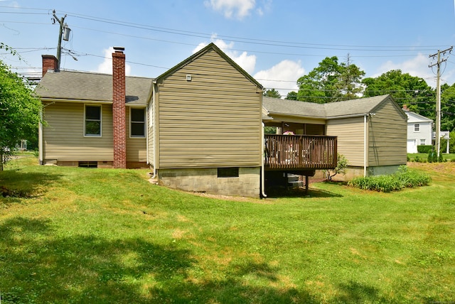 20 Battle St, Somers, CT 06071 - rear view of house featuring a deck, a lawn, and a chimney