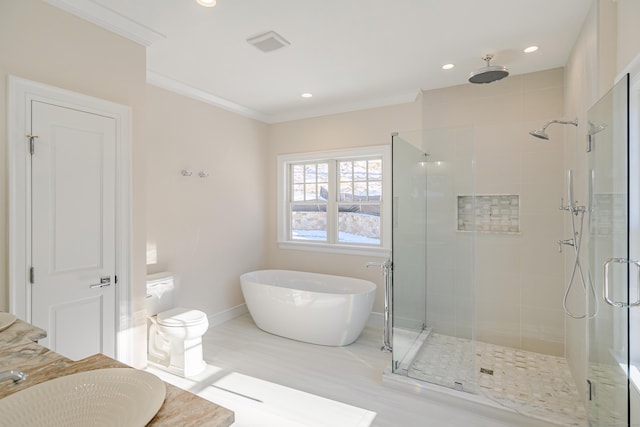 19 Ives Ct, Ridgefield, CT 06877 - full bathroom featuring a shower stall, a freestanding tub, crown molding, vanity, and recessed lighting