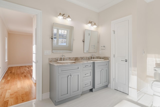 19 Ives Ct, Ridgefield, CT 06877 - full bathroom featuring wood finished floors, crown molding, and double vanity