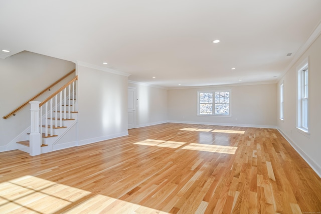 19 Ives Ct, Ridgefield, CT 06877 - unfurnished living room with stairs, light wood-type flooring, crown molding, and recessed lighting
