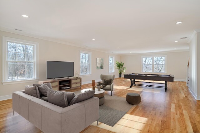 19 Ives Ct, Ridgefield, CT 06877 - living area featuring plenty of natural light, crown molding, pool table, light wood-style flooring, and recessed lighting