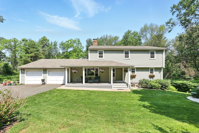 247 Mountain View Rd, Somers, CT 06071 - view of front of house with a chimney, a porch, a front yard, and driveway