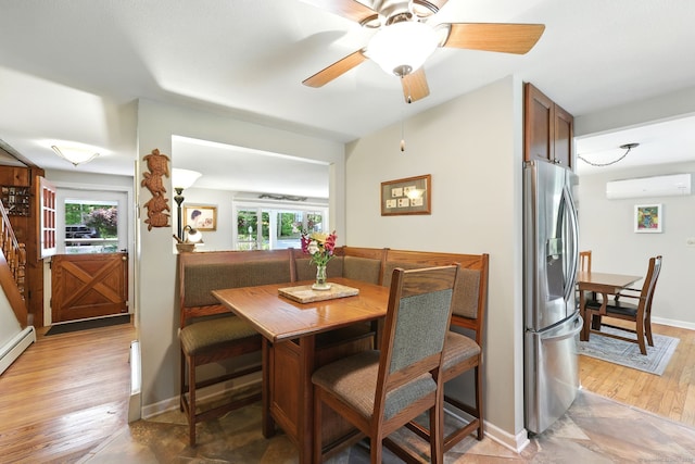 247 Mountain View Rd, Somers, CT 06071 - dining room featuring a wall mounted air conditioner, plenty of natural light, light wood finished floors, and a ceiling fan