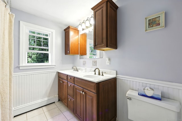 247 Mountain View Rd, Somers, CT 06071 - bathroom featuring a baseboard radiator, a wainscoted wall, plenty of natural light, tile patterned floors, and double vanity