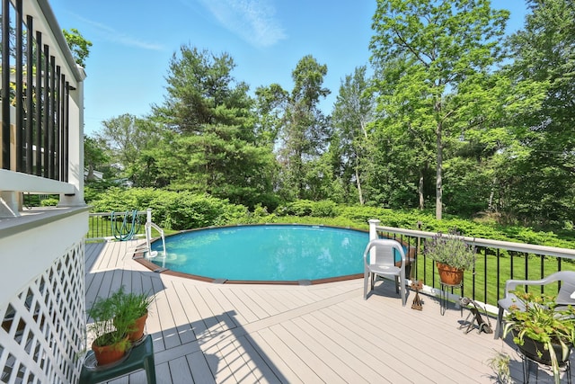 247 Mountain View Rd, Somers, CT 06071 - outdoor pool featuring a deck and view of wooded area