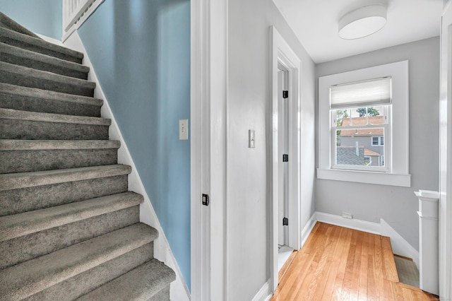 946 Wilcoxson Ave, Stratford, CT 06614 - stairs with wood-type flooring and baseboards
