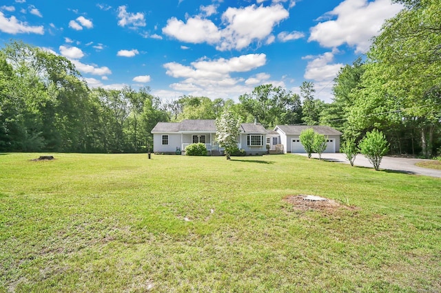 125 E Old Route 6, Hampton, CT 06247 - view of grassy yard with a garage and concrete driveway