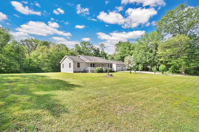 125 E Old Route 6, Hampton, CT 06247 - view of green lawn with an attached garage and driveway