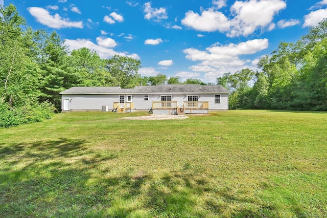 125 E Old Route 6, Hampton, CT 06247 - back of house featuring a deck and a lawn