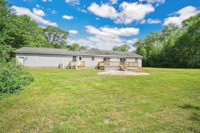 125 E Old Route 6, Hampton, CT 06247 - rear view of house with a deck and a yard