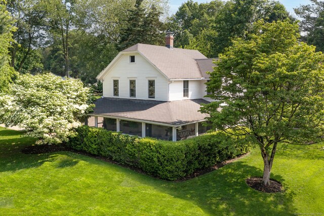 7 Morningside Ln, Westport, CT 06880 - view of front of property with a front yard, a chimney, and roof with shingles