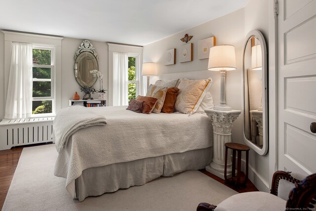7 Morningside Ln, Westport, CT 06880 - bedroom featuring radiator heating unit and wood finished floors