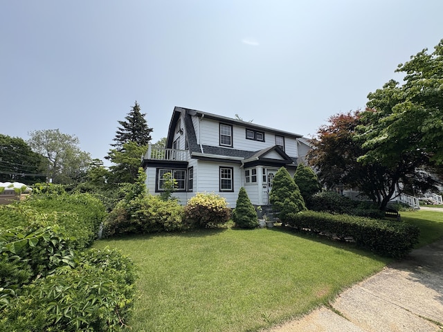 5 Lindsley Pl, Stratford, CT 06615 - view of front of property featuring a front yard and a balcony