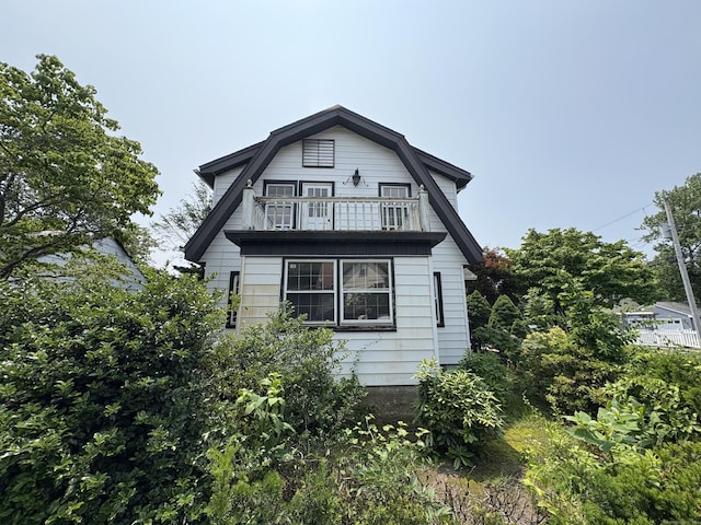5 Lindsley Pl, Stratford, CT 06615 - view of property exterior featuring a balcony and a gambrel roof