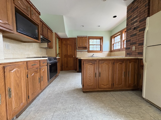 5 Lindsley Pl, Stratford, CT 06615 - kitchen featuring freestanding refrigerator, under cabinet range hood, electric stove, decorative backsplash, and recessed lighting