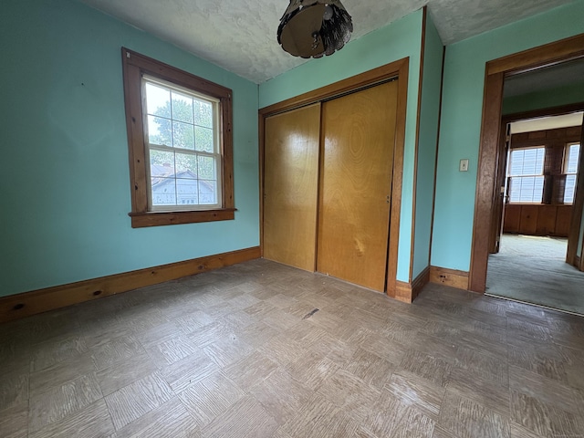 5 Lindsley Pl, Stratford, CT 06615 - unfurnished bedroom with baseboards and a closet